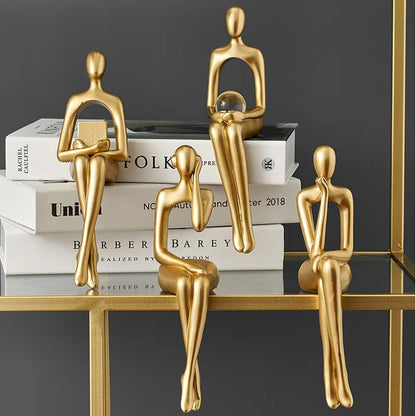 Gold Thinker Statues