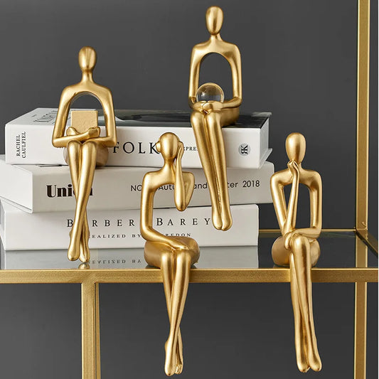Gold Thinker Statues